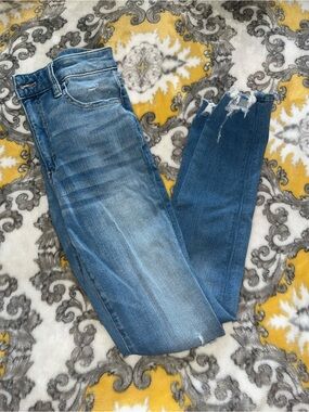 American Eagle Outfitters Light Blue Skinny Jeans with Frayed Hem